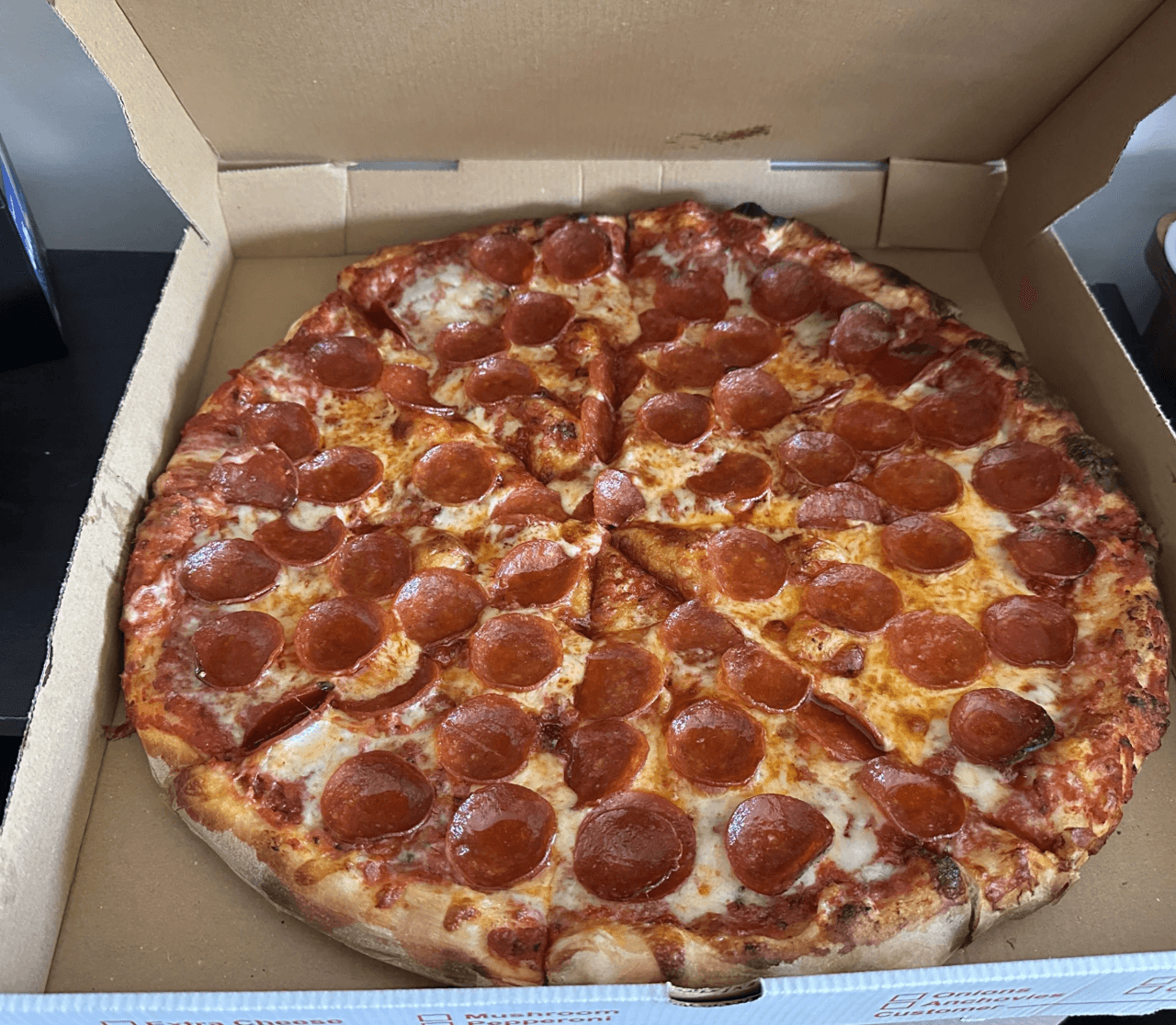Fresh made pepperoni pizza with fluffy dough
